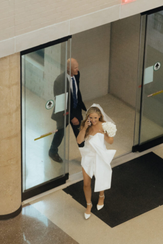 A bride and groom have a candid documentary elopement wedding ceremony in Dallas, Texas, followed by modern classy bridal portraits and candid photos while interacting with their reception guests.