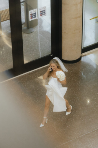 A bride and groom have a candid documentary elopement wedding ceremony in Dallas, Texas, followed by modern classy bridal portraits and candid photos while interacting with their reception guests.