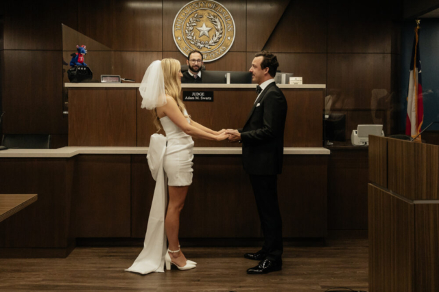 A bride and groom have a candid documentary elopement wedding ceremony in Dallas, Texas, followed by modern classy bridal portraits and candid photos while interacting with their reception guests.