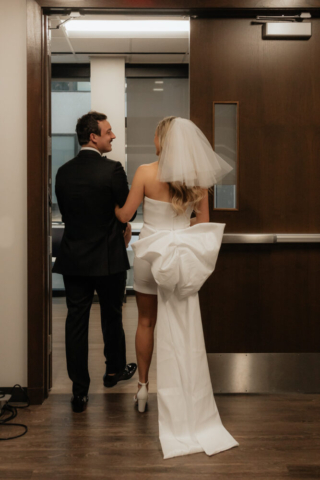 A bride and groom have a candid documentary elopement wedding ceremony in Dallas, Texas, followed by modern classy bridal portraits and candid photos while interacting with their reception guests.