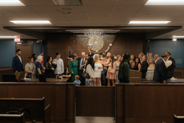 A bride and groom have a candid documentary elopement wedding ceremony in Dallas, Texas, followed by modern classy bridal portraits and candid photos while interacting with their reception guests.