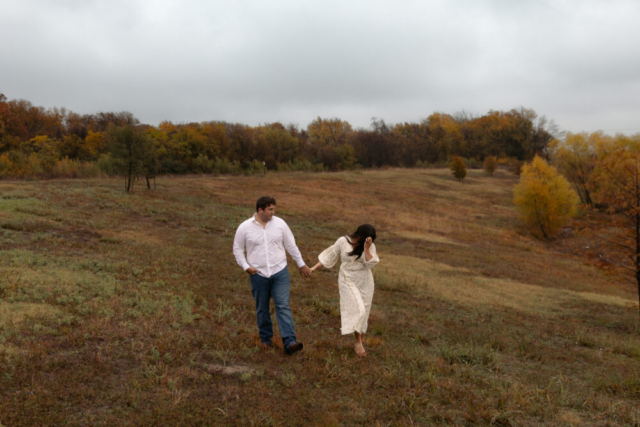 A young couple take their documentary and romantic engagement photos by a Texas DFW cinematic, moody, documentary style photographer.