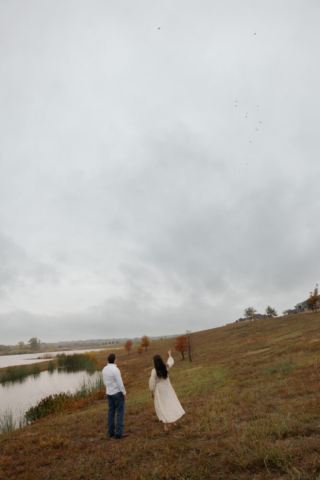 A young couple take their documentary and romantic engagement photos by a Texas DFW cinematic, moody, documentary style photographer.