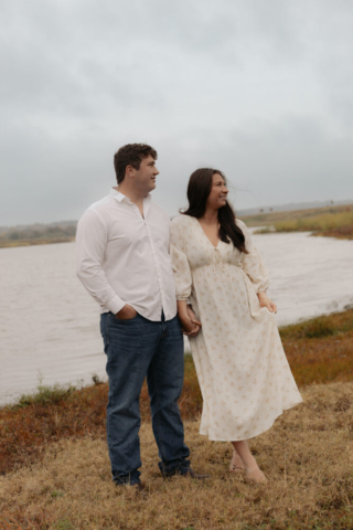 A young couple take their documentary and romantic engagement photos by a Texas DFW cinematic, moody, documentary style photographer.