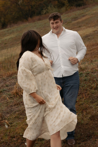 A young couple take their documentary and romantic engagement photos by a Texas DFW cinematic, moody, documentary style photographer.