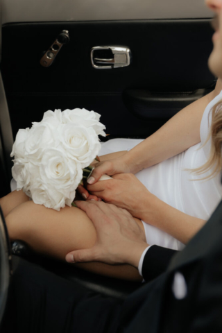 A bride and groom have a candid documentary elopement wedding ceremony in Dallas, Texas, followed by modern classy bridal portraits and candid photos while interacting with their reception guests.