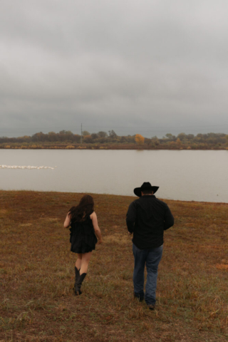 A young couple take their documentary and romantic engagement photos by a Texas DFW cinematic, moody, documentary style photographer.