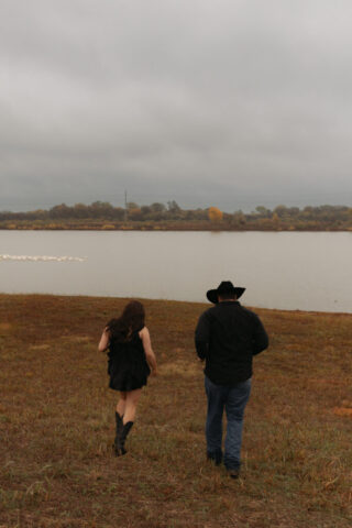 A young couple take their documentary and romantic engagement photos by a Texas DFW cinematic, moody, documentary style photographer.
