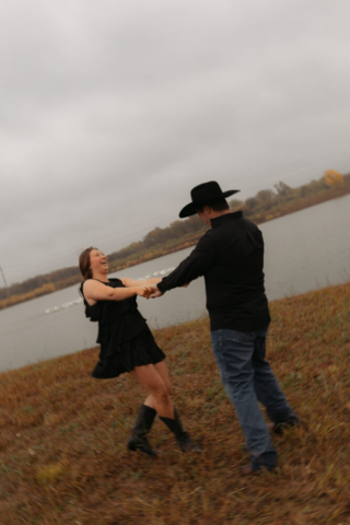 A young couple take their documentary and romantic engagement photos by a Texas DFW cinematic, moody, documentary style photographer.