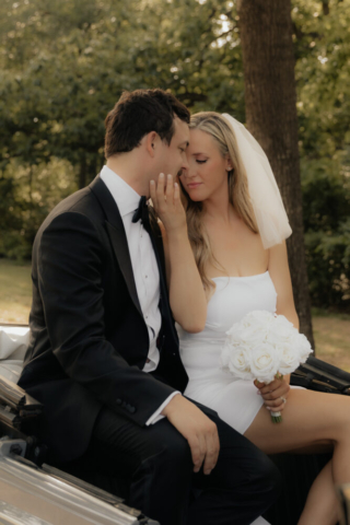 A bride and groom have a candid documentary elopement wedding ceremony in Dallas, Texas, followed by modern classy bridal portraits and candid photos while interacting with their reception guests.