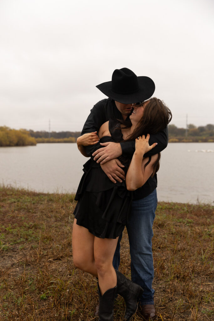 A young couple take their documentary and romantic engagement photos by a Texas DFW cinematic, moody, documentary style photographer.