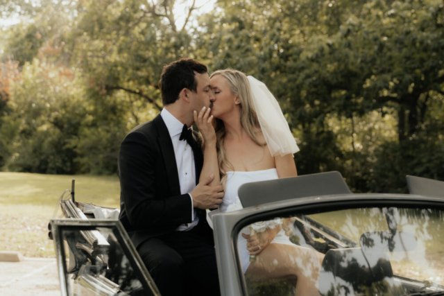 A bride and groom have a candid documentary elopement wedding ceremony in Dallas, Texas, followed by modern classy bridal portraits and candid photos while interacting with their reception guests.