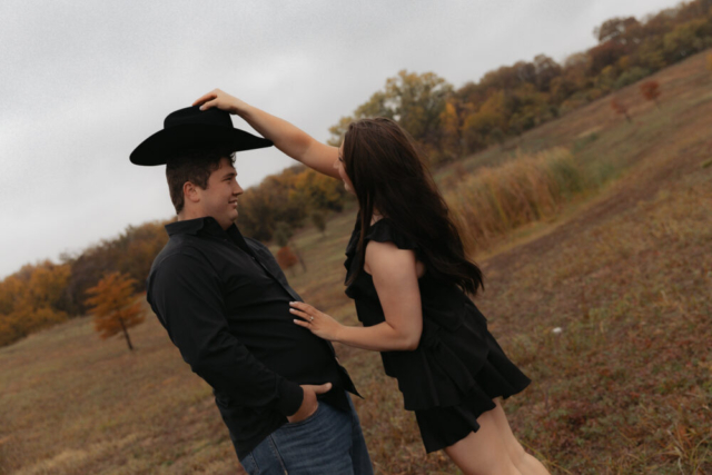 A young couple take their documentary and romantic engagement photos by a Texas DFW cinematic, moody, documentary style photographer.