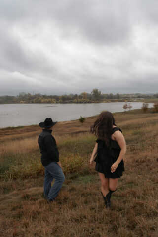 A young couple take their documentary and romantic engagement photos by a Texas DFW cinematic, moody, documentary style photographer.