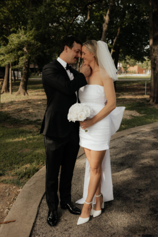 A bride and groom have a candid documentary elopement wedding ceremony in Dallas, Texas, followed by modern classy bridal portraits and candid photos while interacting with their reception guests.