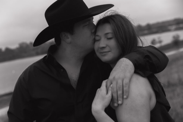 A young couple take their documentary and romantic engagement photos by a Texas DFW cinematic, moody, documentary style photographer.