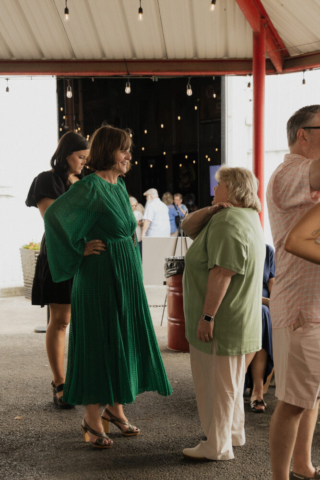 A bride and groom have a candid documentary elopement wedding ceremony in Dallas, Texas, followed by modern classy bridal portraits and candid photos while interacting with their reception guests.