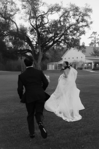 A bride and groom have a candid documentary elopement wedding ceremony in Houston, Texas at the Addison Woods Wedding Venue followed by modern classy bridal portraits and candid photos while interacting with their reception guests.