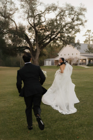 A bride and groom have a candid documentary elopement wedding ceremony in Houston, Texas at the Addison Woods Wedding Venue followed by modern classy bridal portraits and candid photos while interacting with their reception guests.