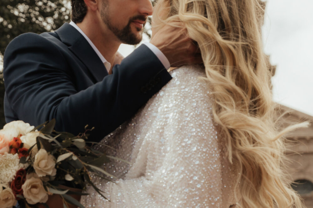 A young bride and groom at the Tarrant County Courthouse and Fort Worth Stockyards on their intimate elopement wedding day in Fort Worth, Texas.