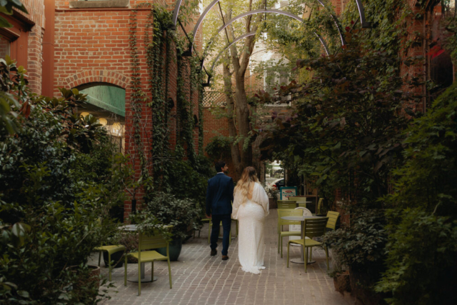 A young bride and groom at the Tarrant County Courthouse and Fort Worth Stockyards on their intimate elopement wedding day in Fort Worth, Texas.