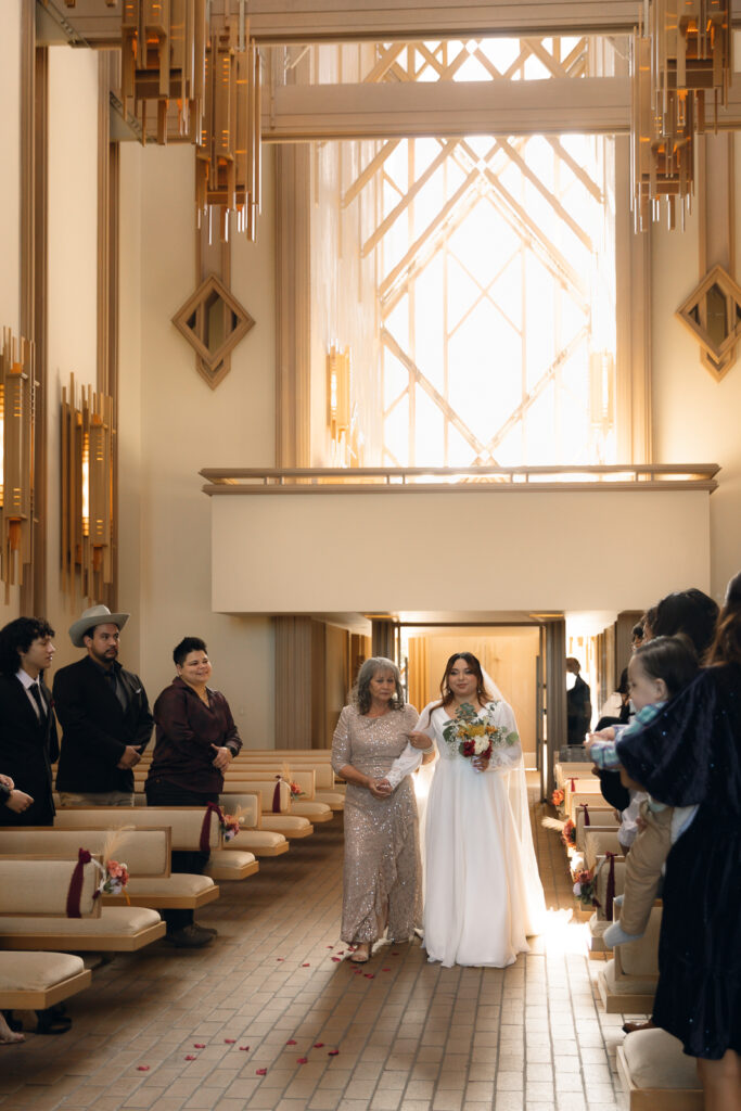 A young couple has their intimate wedding at the Marty Leonard Chapel in Fort Worth, Texas by a Texas DFW documentary wedding photographer ( Hannah Lylene Photography) A young couple has their intimate wedding at the Marty Leonard Chapel in Fort Worth, Texas by a Texas DFW documentary wedding photographer ( Hannah Lylene Photography)
