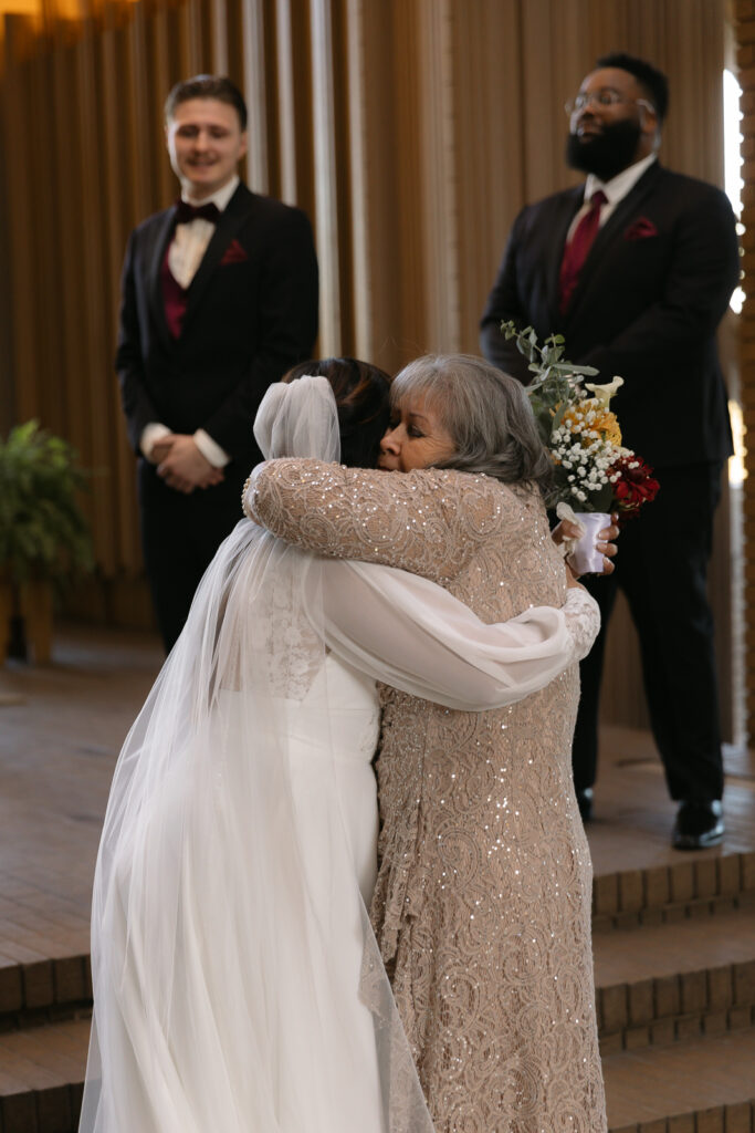 A young couple has their intimate wedding at the Marty Leonard Chapel in Fort Worth, Texas by a Texas DFW documentary wedding photographer ( Hannah Lylene Photography) A young couple has their intimate wedding at the Marty Leonard Chapel in Fort Worth, Texas by a Texas DFW documentary wedding photographer ( Hannah Lylene Photography)
