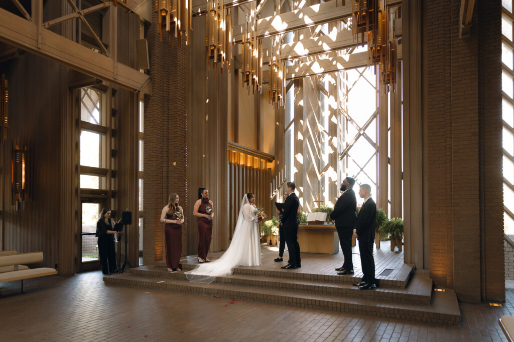 A young couple has their intimate wedding at the Marty Leonard Chapel in Fort Worth, Texas by a Texas DFW documentary wedding photographer ( Hannah Lylene Photography) A young couple has their intimate wedding at the Marty Leonard Chapel in Fort Worth, Texas by a Texas DFW documentary wedding photographer ( Hannah Lylene Photography)