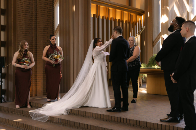 A young couple has their intimate wedding at the Marty Leonard Chapel in Fort Worth, Texas by a Texas DFW documentary wedding photographer ( Hannah Lylene Photography)