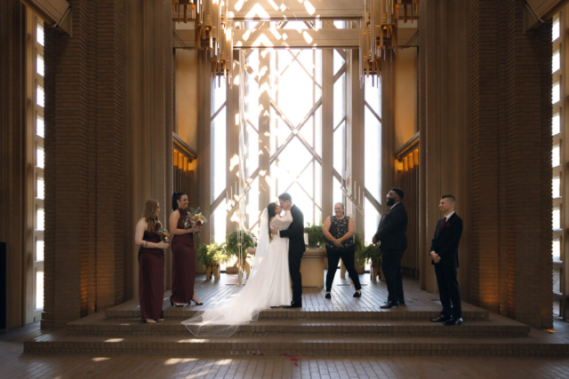 A young couple has their intimate wedding at the Marty Leonard Chapel in Fort Worth, Texas by a Texas DFW documentary wedding photographer ( Hannah Lylene Photography)