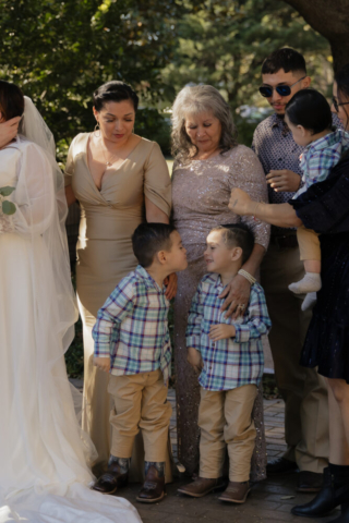 A young couple has their intimate wedding at the Marty Leonard Chapel in Fort Worth, Texas by a Texas DFW documentary wedding photographer ( Hannah Lylene Photography)