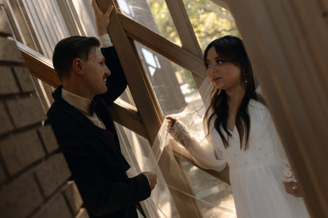 A young couple has their intimate wedding at the Marty Leonard Chapel in Fort Worth, Texas by a Texas DFW documentary wedding photographer ( Hannah Lylene Photography)