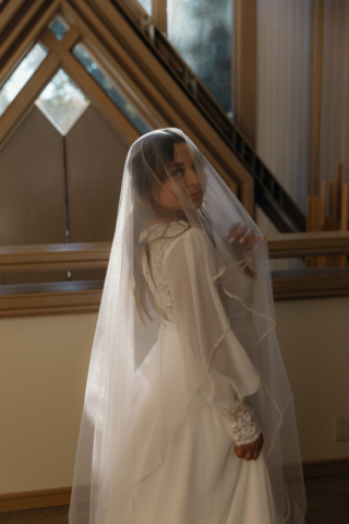 A young couple has their intimate wedding at the Marty Leonard Chapel in Fort Worth, Texas by a Texas DFW documentary wedding photographer ( Hannah Lylene Photography)