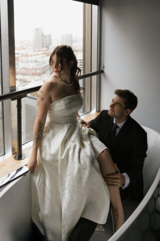 Documentary-style, true-to-color wedding photos from a unique Texas wedding at The Wild Detectives Bookstore in Dallas and The Thompson Hotel. Captured by a DFW wedding photographer, highlighting candid moments and cinematic charm.