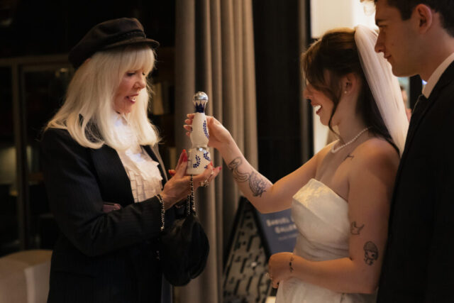 Documentary-style, true-to-color wedding photos from a unique Texas wedding at The Wild Detectives Bookstore in Dallas and The Thompson Hotel. Captured by a DFW wedding photographer, highlighting candid moments and cinematic charm.