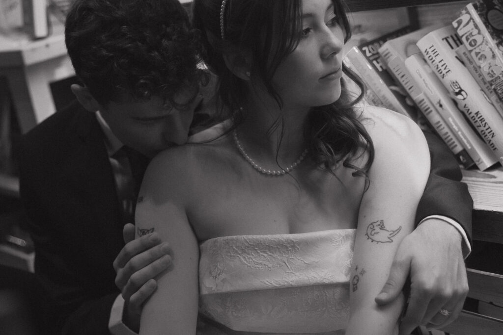 Documentary-style, true-to-color wedding photos from a unique Texas wedding at The Wild Detectives Bookstore in Dallas and The Thompson Hotel. Captured by a DFW wedding photographer, highlighting candid moments and cinematic charm.