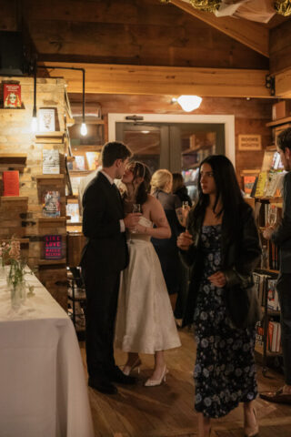 Documentary-style, true-to-color wedding photos from a unique Texas wedding at The Wild Detectives Bookstore in Dallas and The Thompson Hotel. Captured by a DFW wedding photographer, highlighting candid moments and cinematic charm.