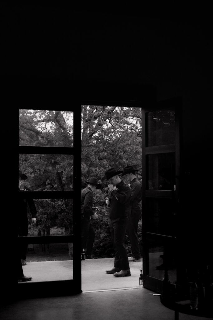True-to-color, cinematic documentary-style wedding photos from a real Texas wedding at HR Ranch. Captured by a DFW wedding photographer, featuring rustic charm and candid moments.