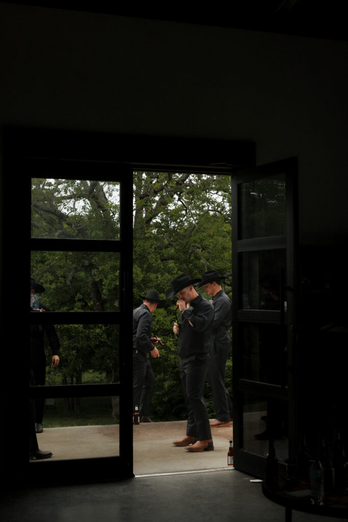 True-to-color, cinematic documentary-style wedding photos from a real Texas wedding at HR Ranch. Captured by a DFW wedding photographer, featuring rustic charm and candid moments.