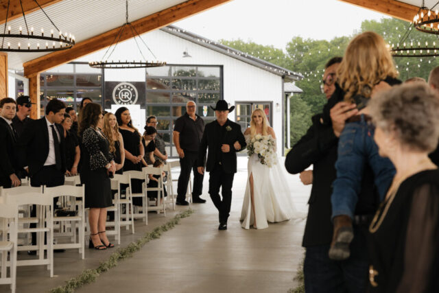 True-to-color, cinematic documentary-style wedding photos from a real Texas wedding at HR Ranch. Captured by a DFW wedding photographer, featuring rustic charm and candid moments.