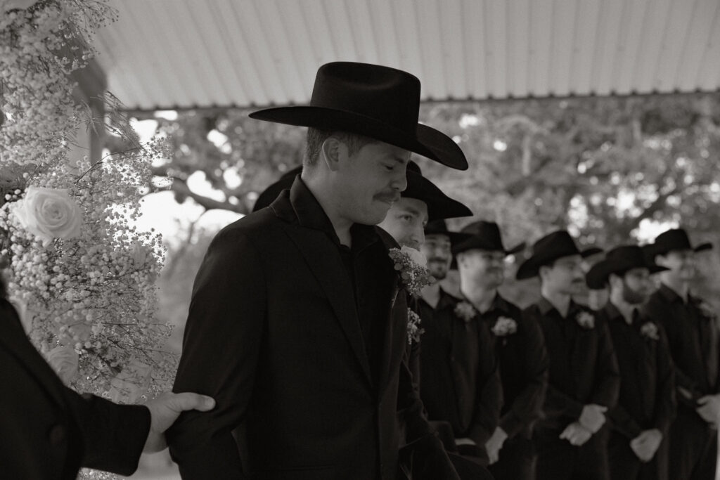 True-to-color, cinematic documentary-style wedding photos from a real Texas wedding at HR Ranch. Captured by a DFW wedding photographer, featuring rustic charm and candid moments.