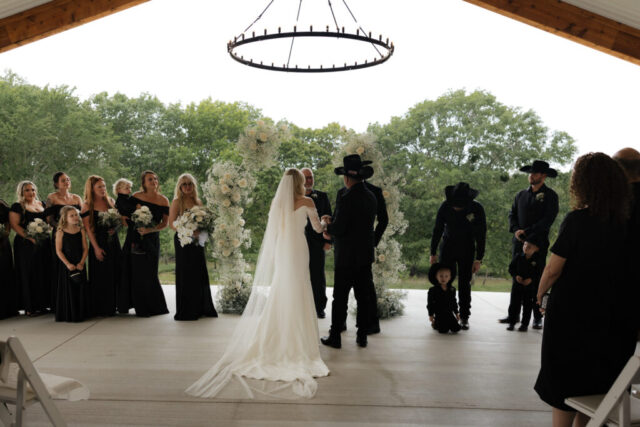 True-to-color, cinematic documentary-style wedding photos from a real Texas wedding at HR Ranch. Captured by a DFW wedding photographer, featuring rustic charm and candid moments.