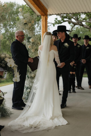 True-to-color, cinematic documentary-style wedding photos from a real Texas wedding at HR Ranch. Captured by a DFW wedding photographer, featuring rustic charm and candid moments.