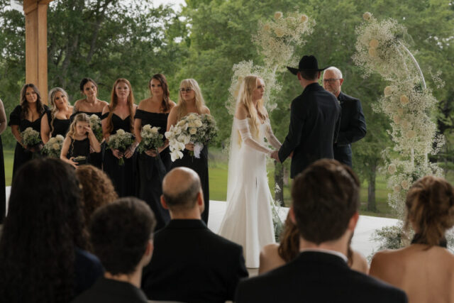True-to-color, cinematic documentary-style wedding photos from a real Texas wedding at HR Ranch. Captured by a DFW wedding photographer, featuring rustic charm and candid moments.
