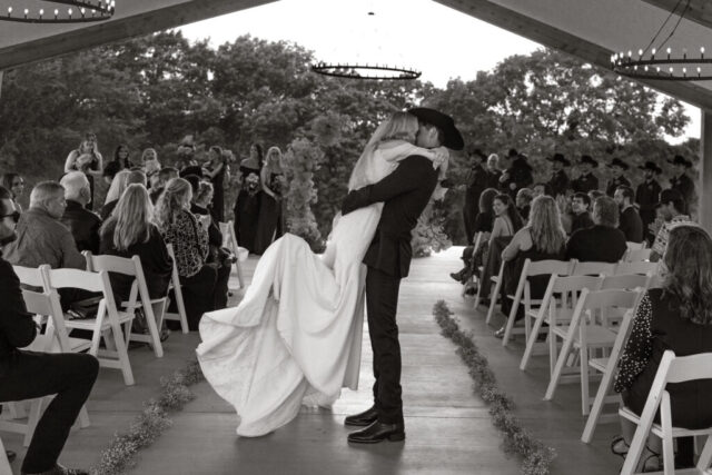 True-to-color, cinematic documentary-style wedding photos from a real Texas wedding at HR Ranch. Captured by a DFW wedding photographer, featuring rustic charm and candid moments.