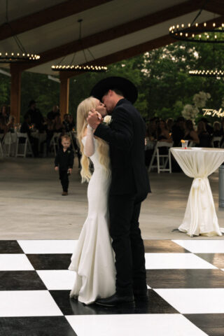 A young couple take their documentary and romantic engagement photos by a Texas DFW cinematic, moody, documentary style photographer.