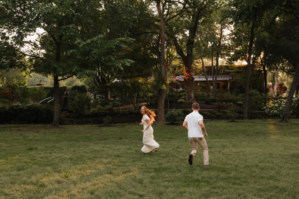Romantic engagement photos at the Grapevine Botanical Garden, capturing a couple&rsquo;s love amidst lush greenery and vibrant blooms. Perfect for couples seeking a serene, nature-inspired setting for their engagement session in DFW.