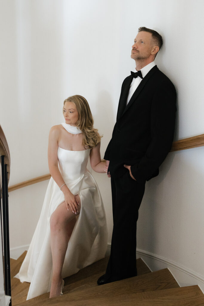 A bride and groom, take couples portraits in their modern aesthetic home at their private wedding ceremony.Timeless indoor wedding in Dallas, captured with a refined, editorial approach by DFW documentary wedding photographer.