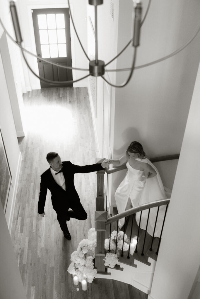 A bride and groom, take couples portraits in their modern aesthetic home at their private wedding ceremony.Timeless indoor wedding in Dallas, captured with a refined, editorial approach by DFW documentary wedding photographer.
