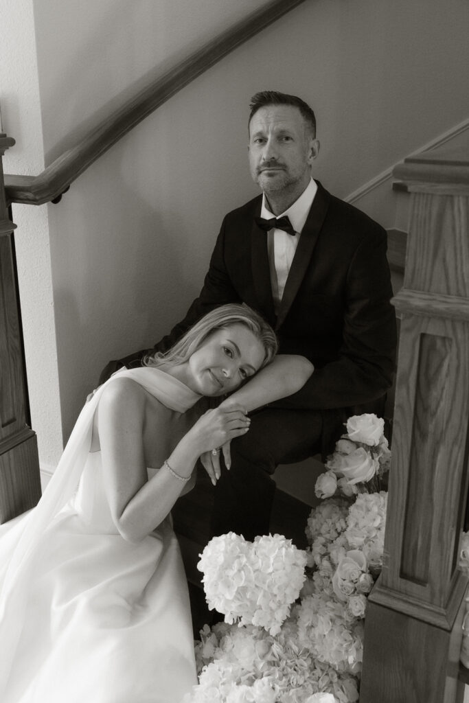 A bride and groom, take couples portraits in their modern aesthetic home at their private wedding ceremony.Timeless indoor wedding in Dallas, captured with a refined, editorial approach by DFW documentary wedding photographer.